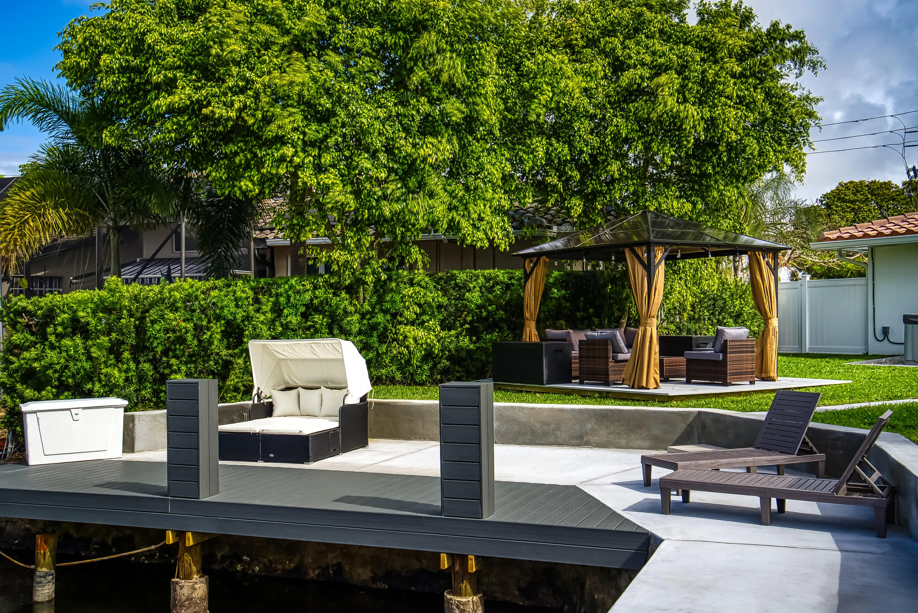 Private dock featuring composite decking and robust pilings