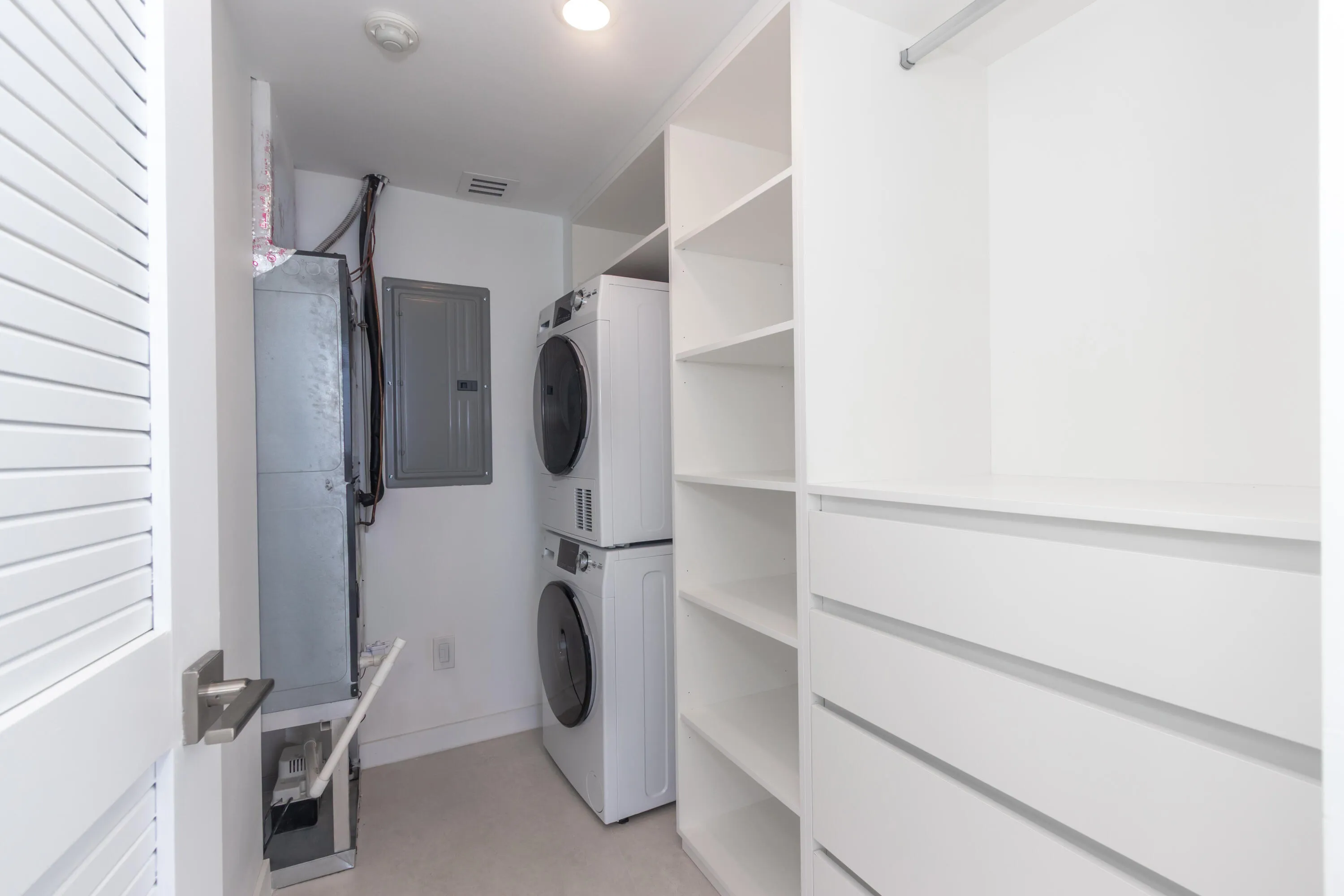 Guest bedroom closet with laundry