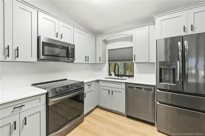 Kitchen with Quarts Countertops