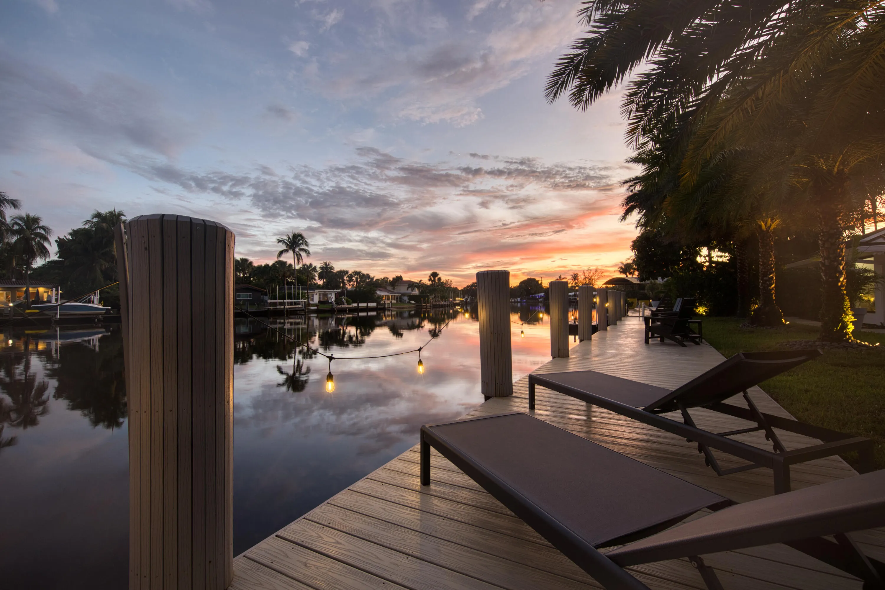 Enjoy colorful sunsets from your private 80 foot dock on the dock
