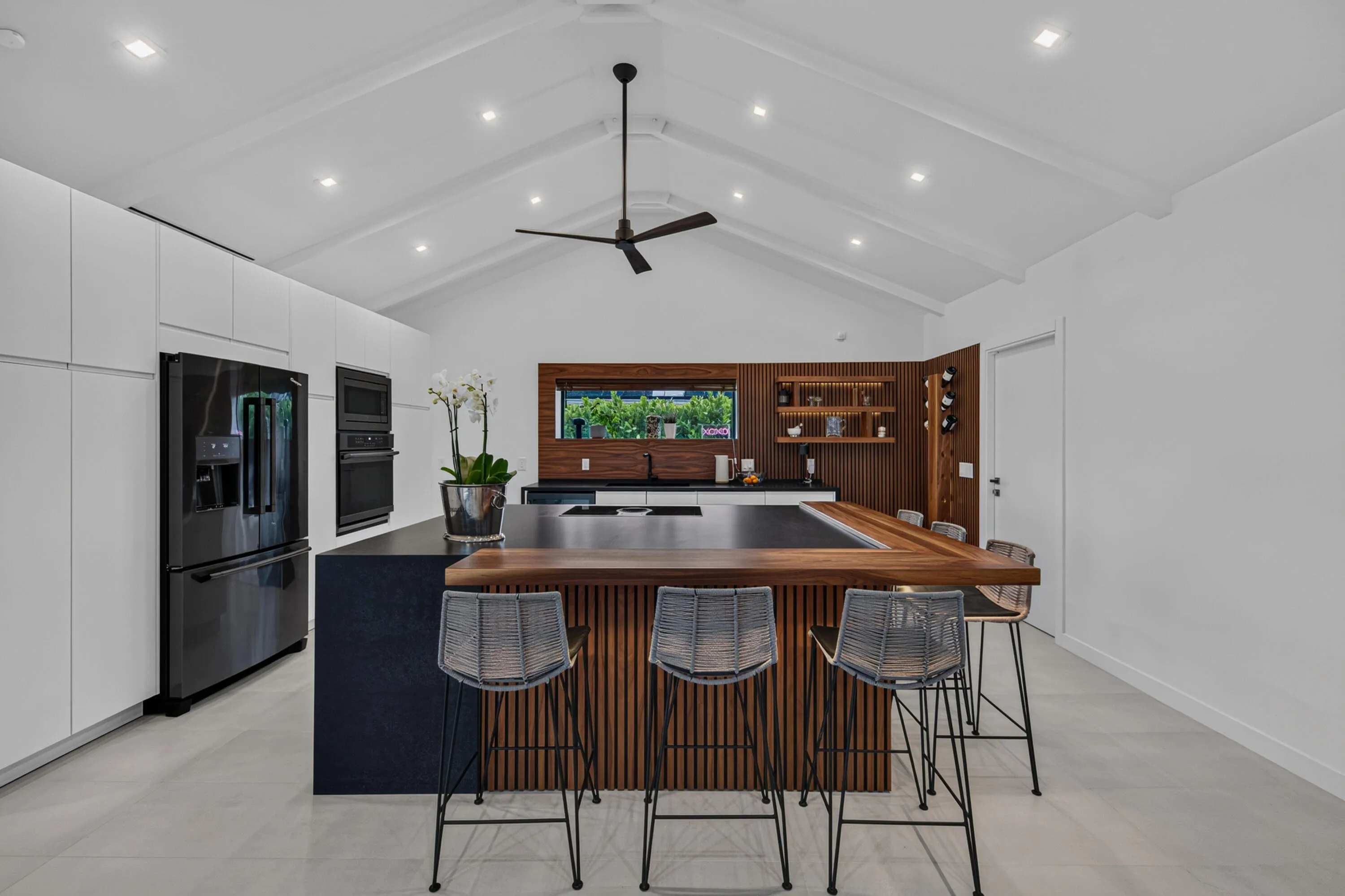 Bespoke, oversized kitchen counter with seating for six