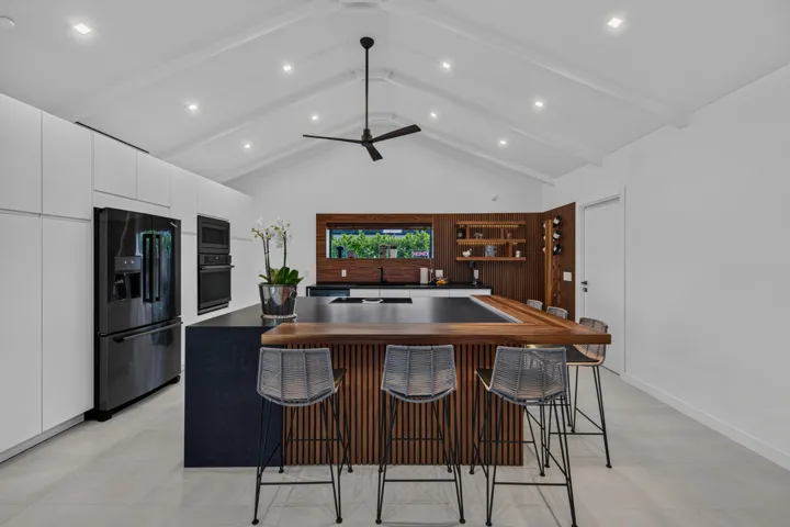 Bespoke, oversized kitchen counter with seating for six
