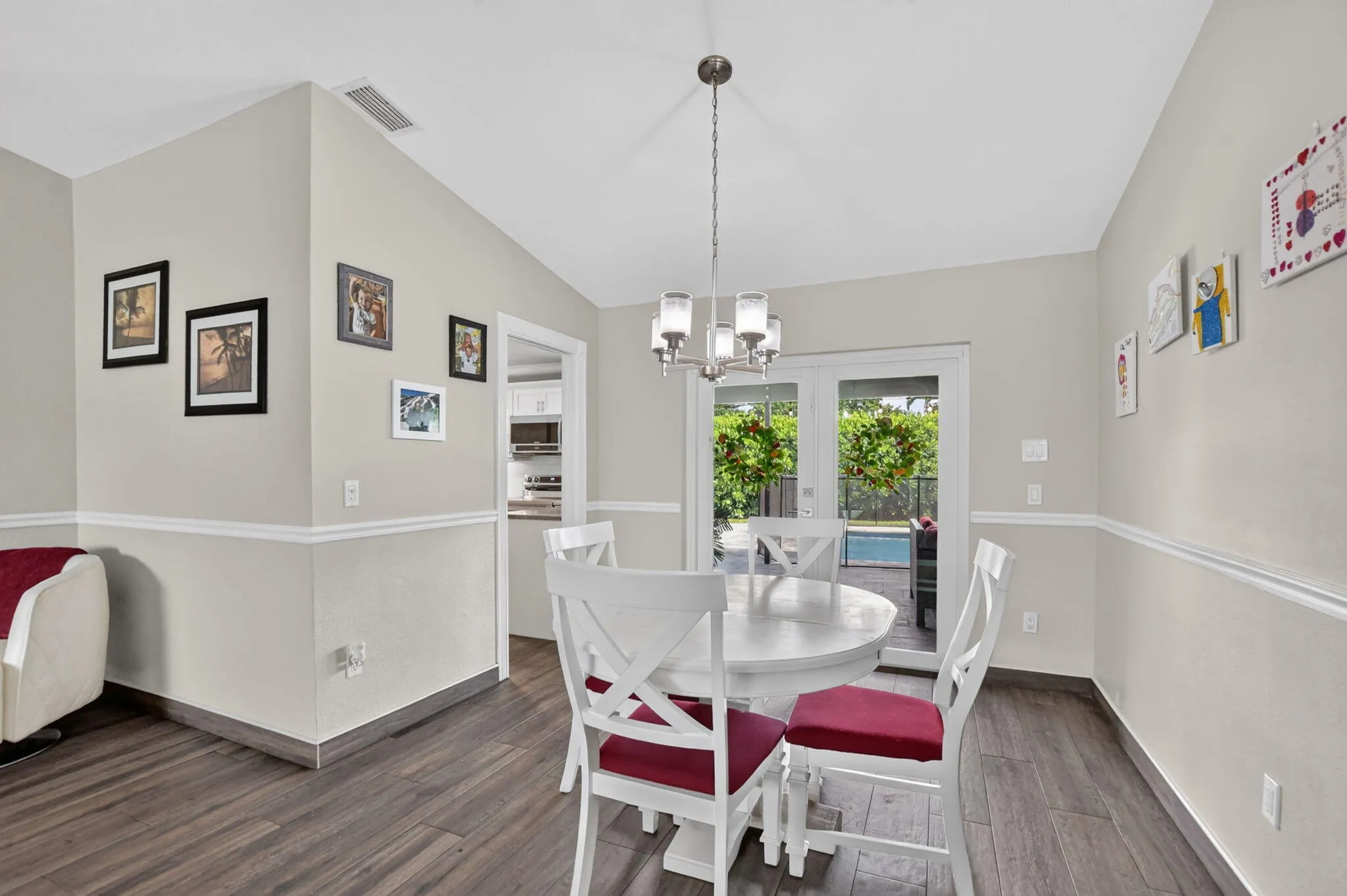 French doors lead out to patio and pool
