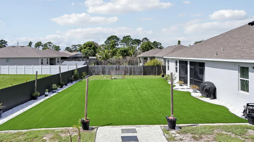 Spacious Backyard with Lush Green Lawn
