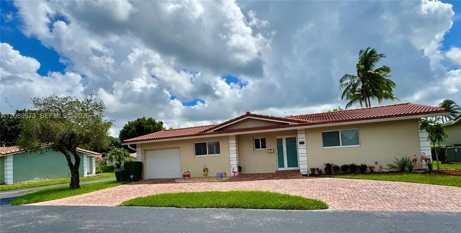 Beautiful home completely remodeled with all top of the line features, appliances, complete hurricane protection with impact windows, doors, garage door! New custom brick driveway. Split BR model, foyer entrance, 1 home away from Plantation Preserve Golf Club! Beautiful home with new interiors, no popcorn ceilings, replaced city water lines, and so much more! Ready to move in and start enjoying life.