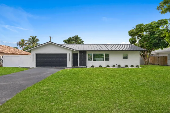 Two Car Garage with Mini Split AC and a Large Driveway!