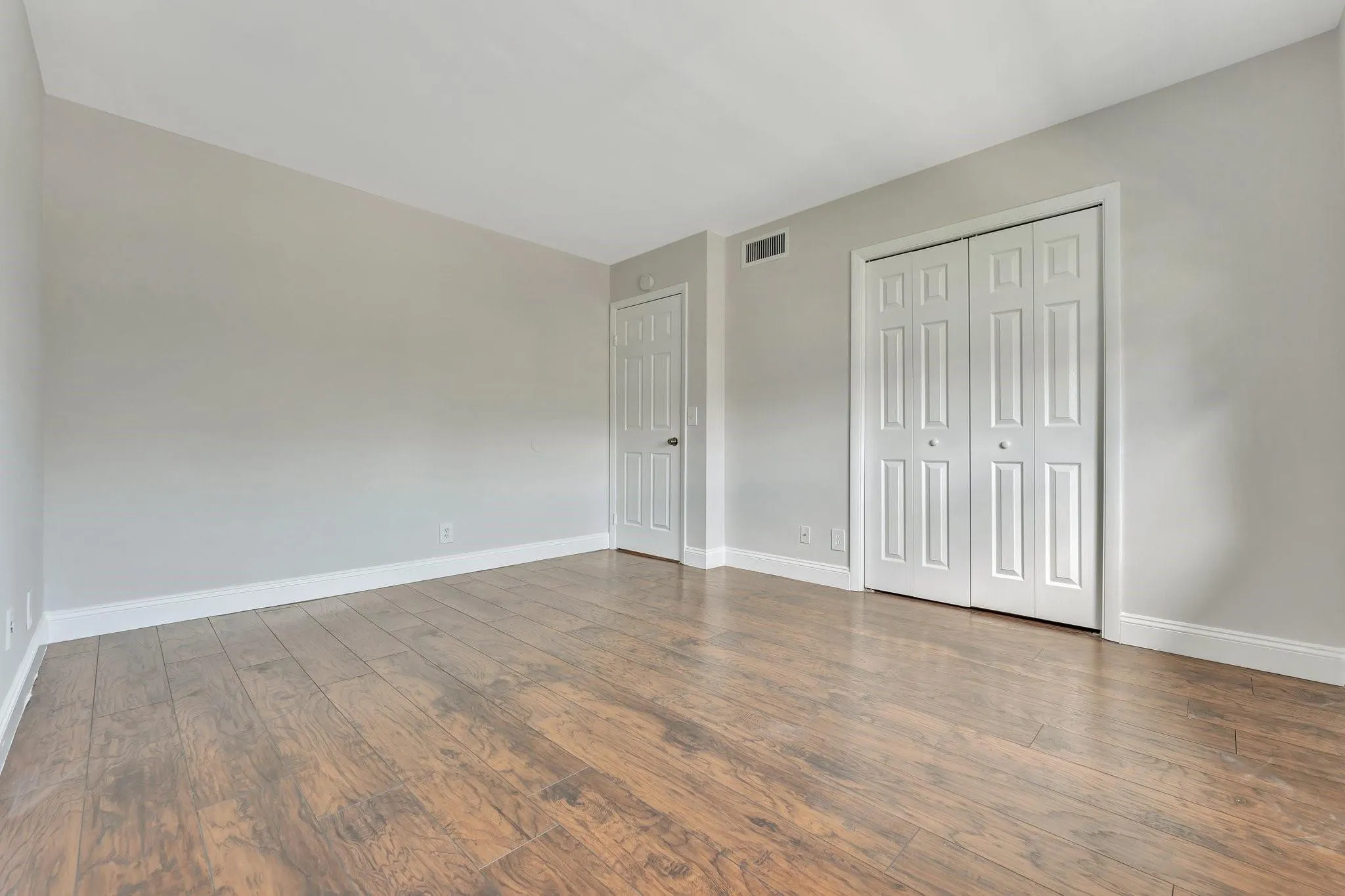 2nd spacious bedroom, shown vacant.