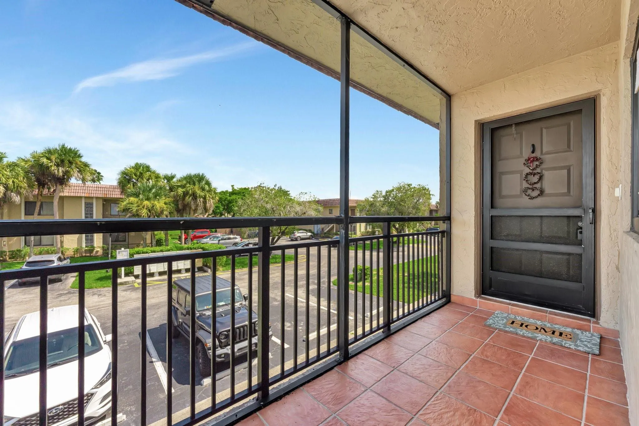 Front door entry with screen porch.