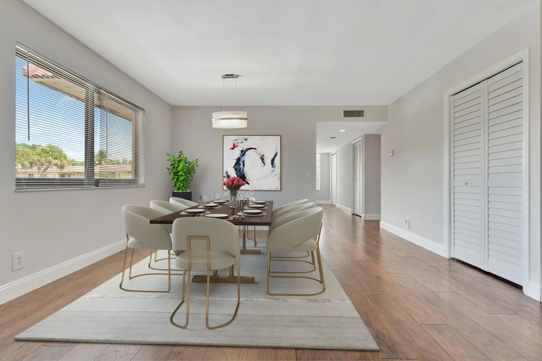 Cool toned fresh paint, smoothed walls and ceilings, sleek lighting fixture provide a contemporary appeal