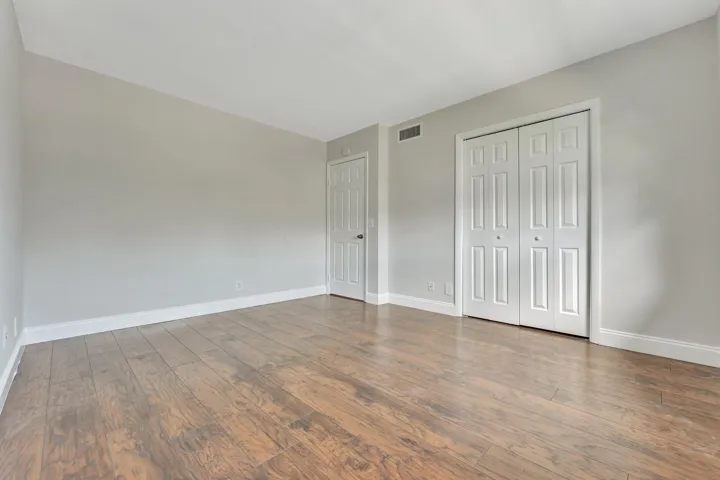 2nd spacious bedroom, shown vacant.