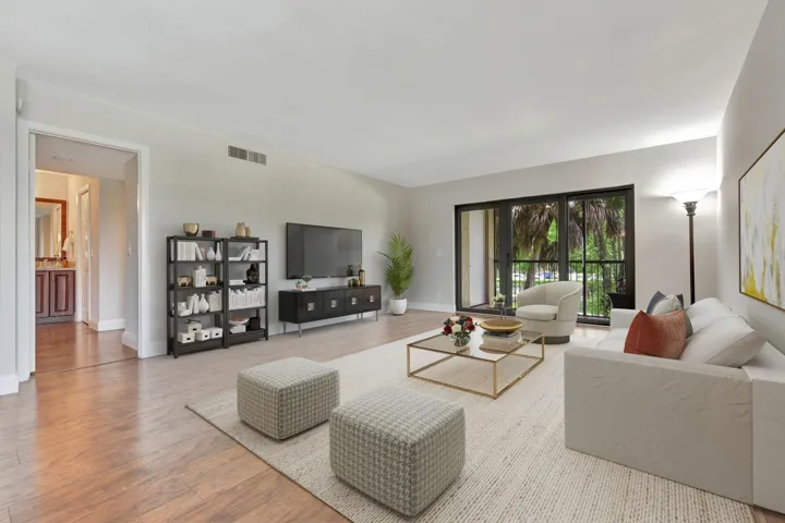 ALL IMPACT GLASS! Flat finish ceilings, newer AC, newer water heater, newer paint.