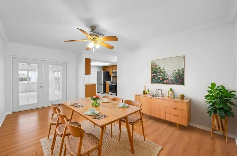 Virtually Staged Photo staged as a dining room. Space could also be used as a family room.