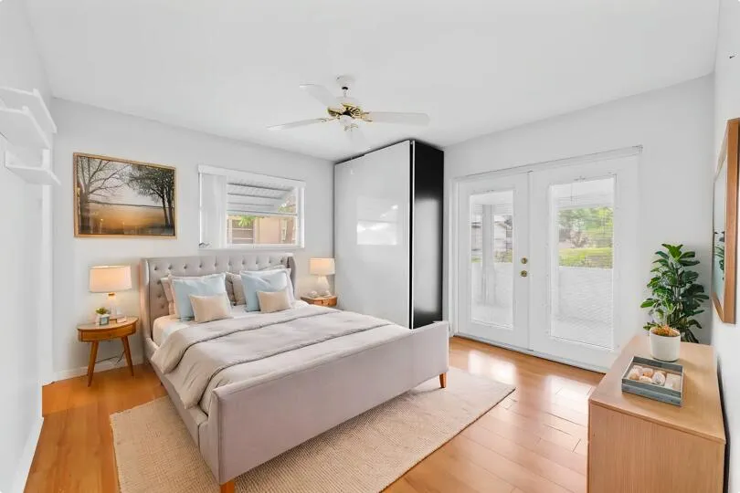 Virtually Staged Photo of Secondary Bedroom. This bedroom also has a walk-in closet in addition to the additionally built storage closet.