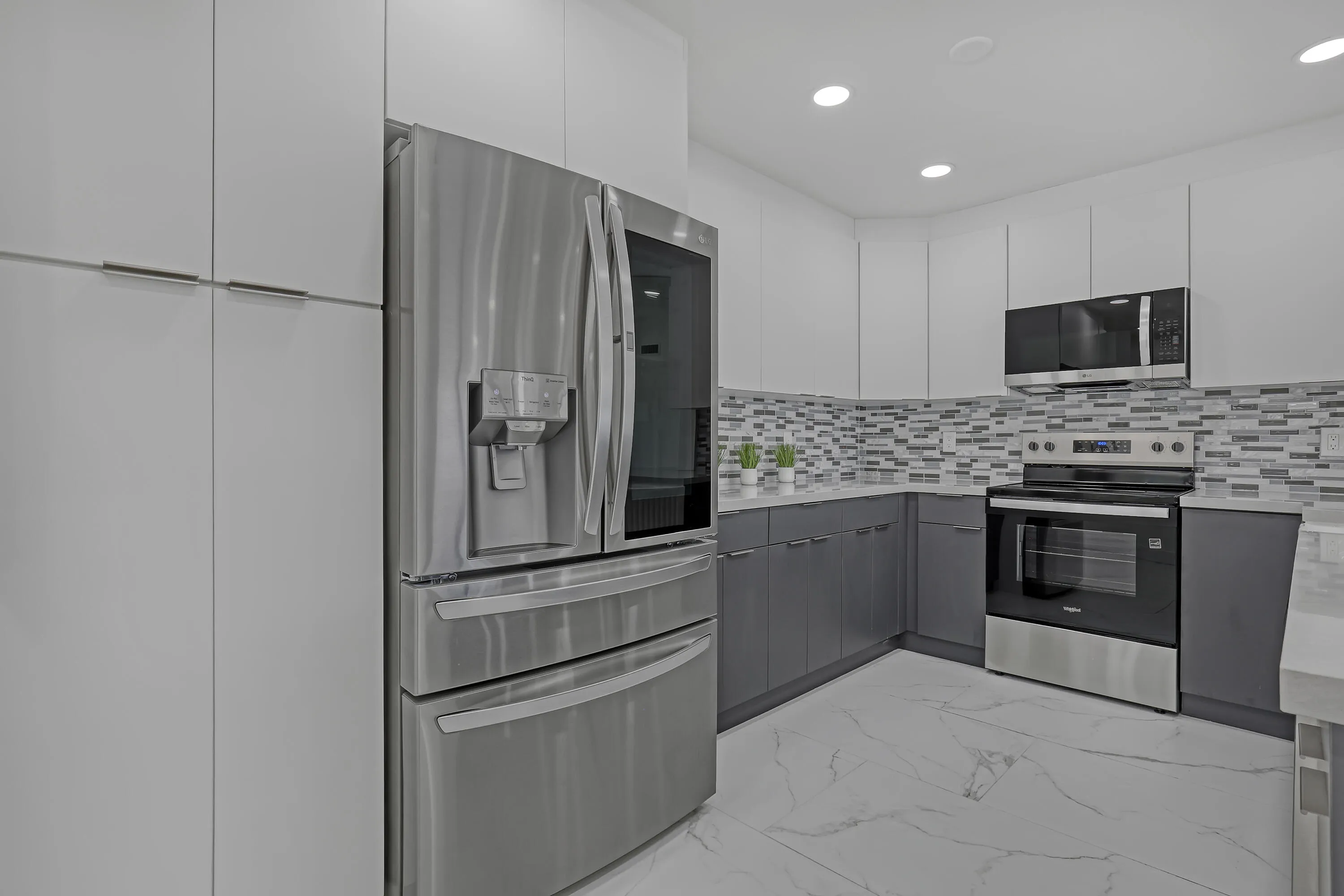 Sleek cabinets and modern appliances.