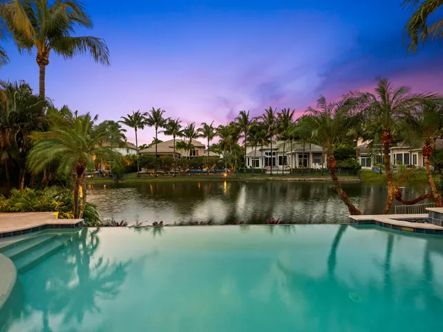Water View at Twilight of Vanishing Edge Heated Pool and Spa