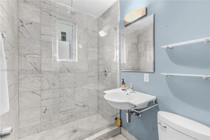 bathroom with walk in shower