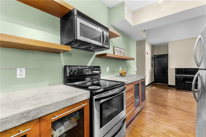 Sleek kitchen with full size appliances