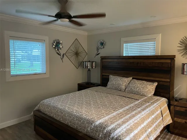 PRIMARY BEDROOM HAS 2 WINDOWS