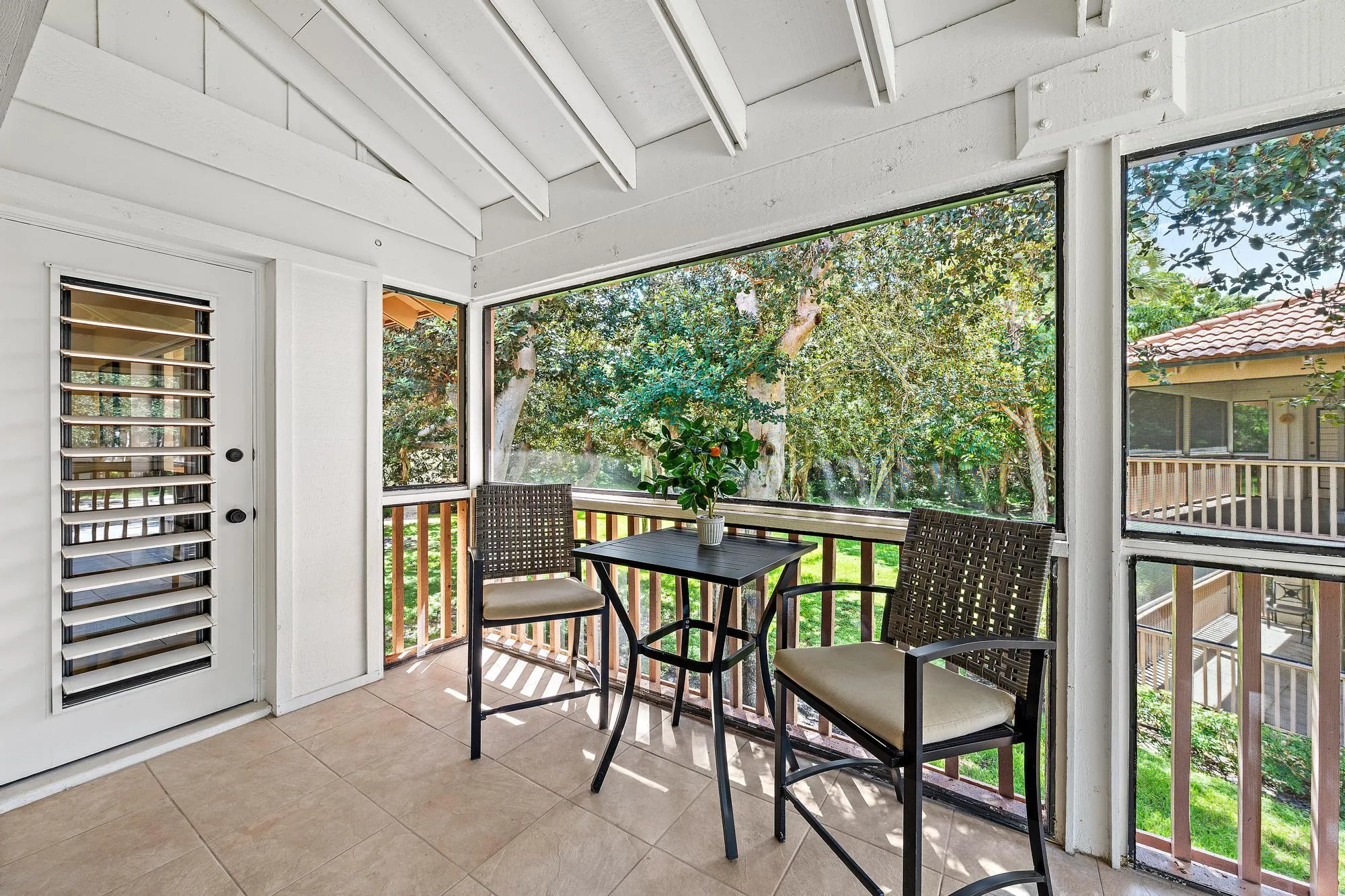 Covered & Screened Balcony