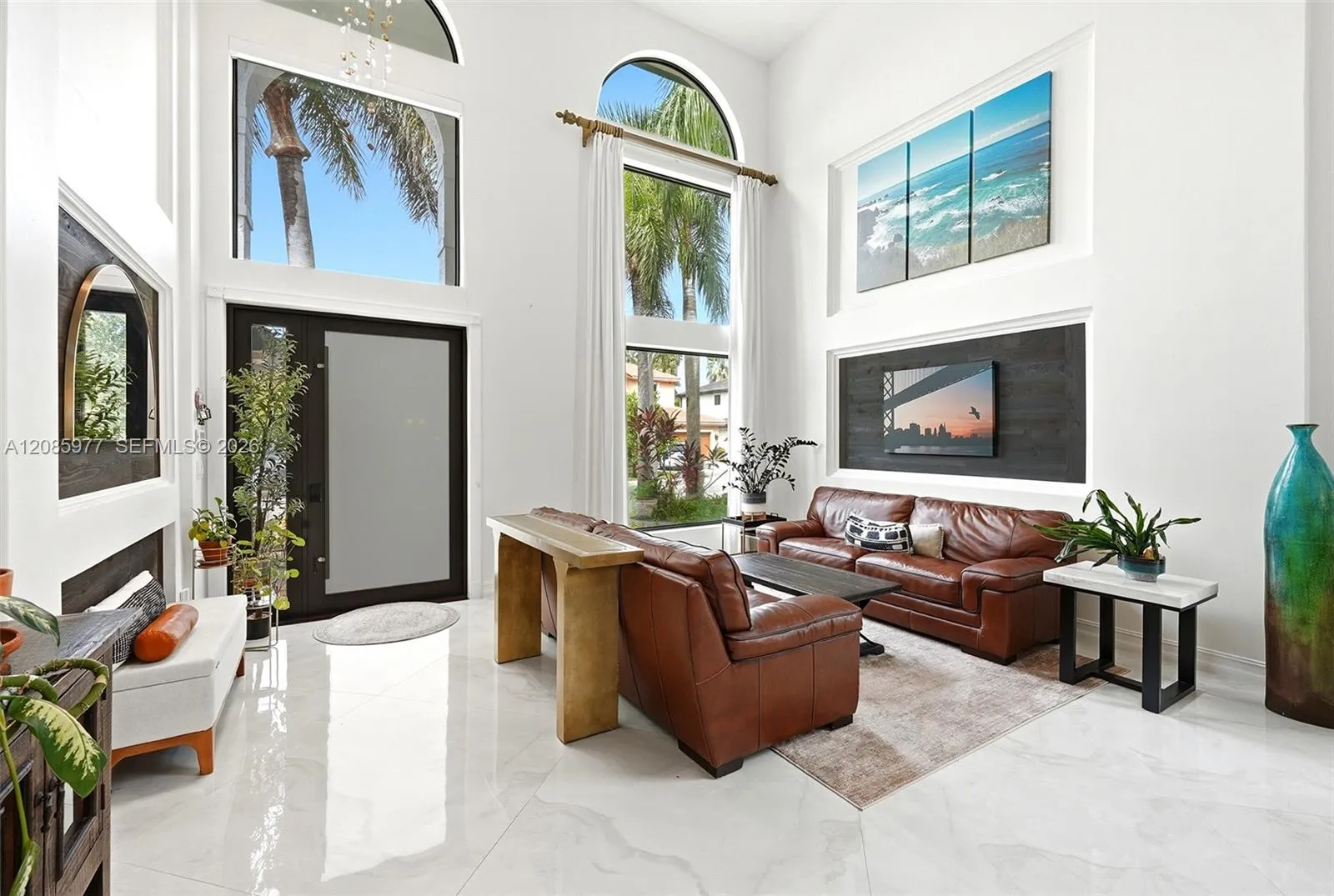 Photo depicting front door and living area