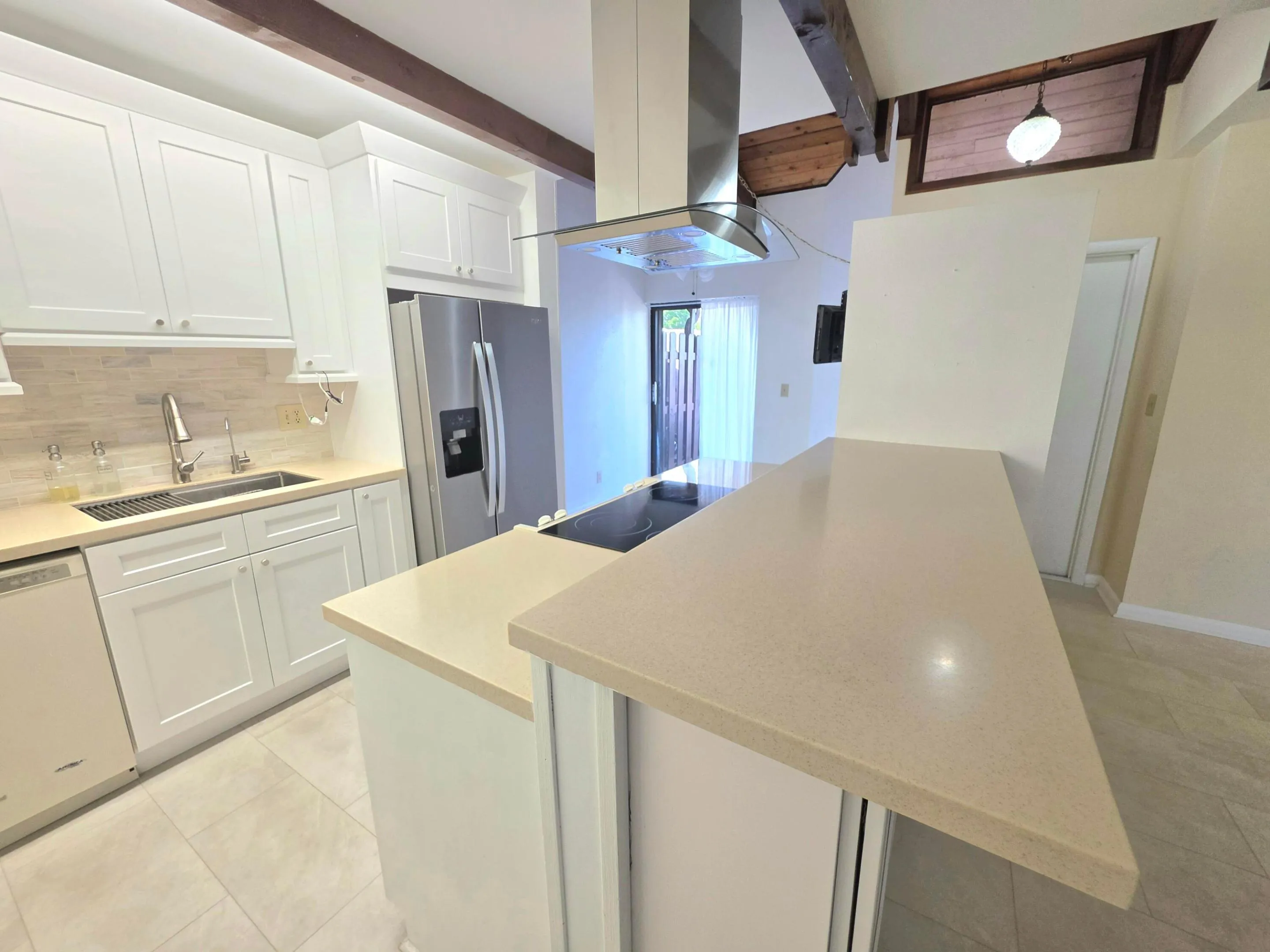 OPEN TO THE DINING/FAMILY ROOM, THIS IS THE PERFECT SPOT FOR ENTERTAINING.