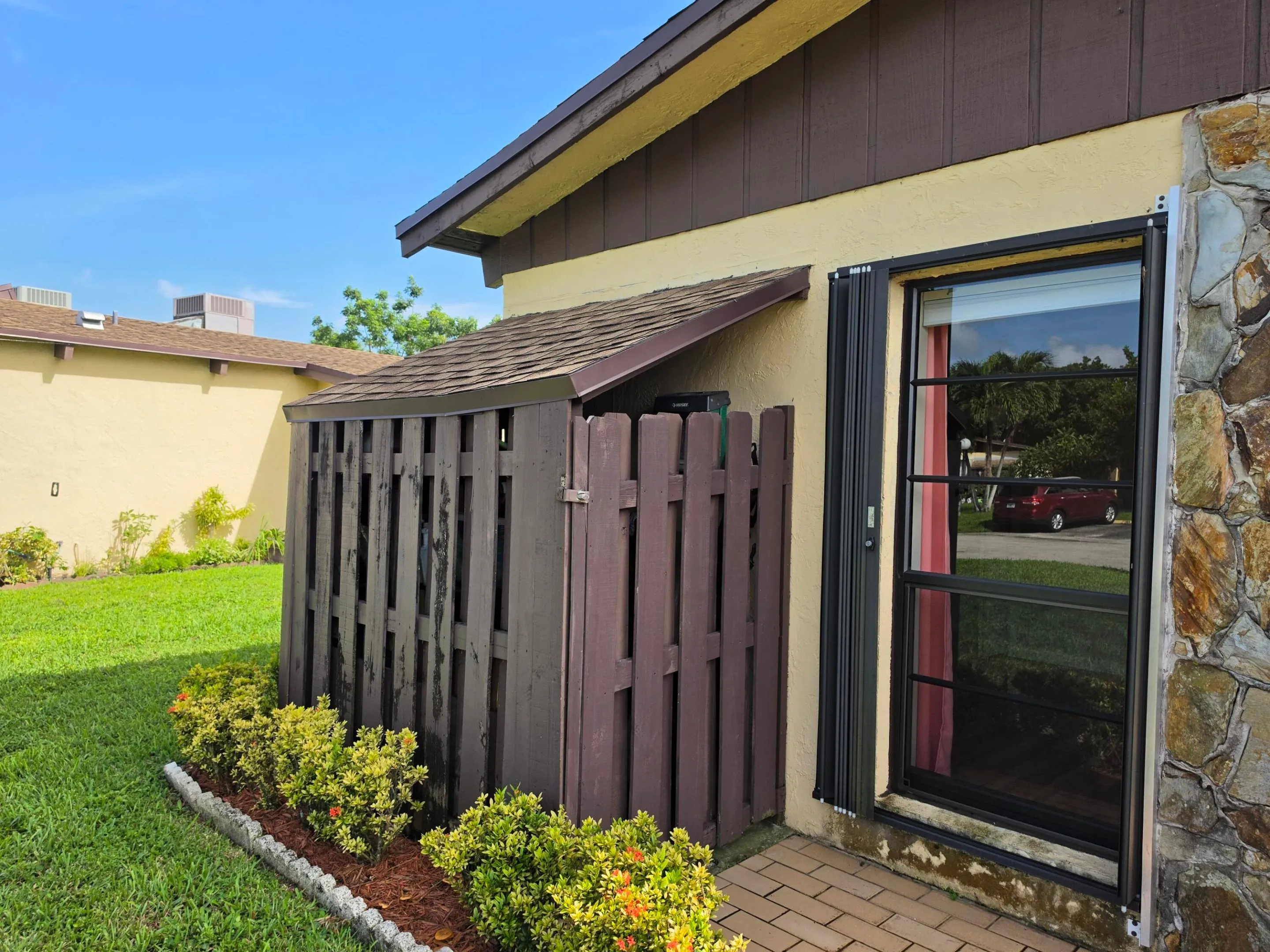 EXTRA STORAGE IS A BREEZE WITH THIS GATED UTILITY CLOSET.