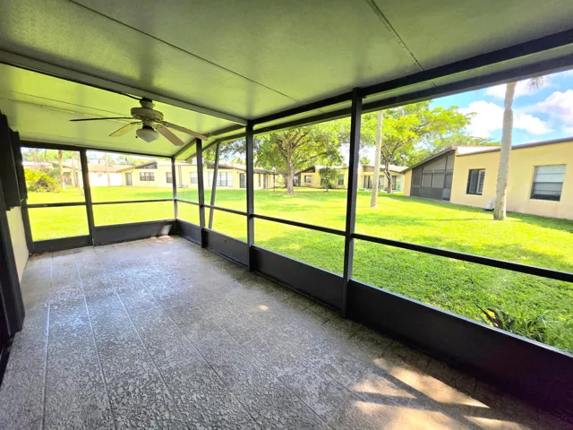 COVERED AND SCREENED, THE OVERSIZED BACK PATIO HAS PLENTY OF SPACE TO ENJOY SUNNY SOUTH FLORIDA WEATHER. COFFEE, BEVERAGES OR A GOOD BOOK..
