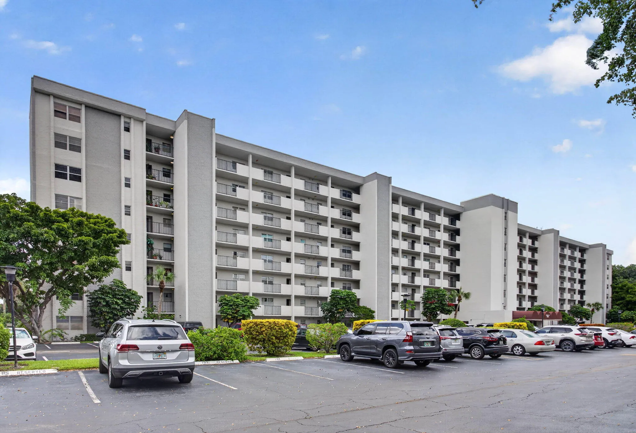 Multi-story residential building with private balconies.
