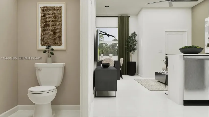 Readily available off the kitchen, this powder room provides easy convenience to residents and guests.