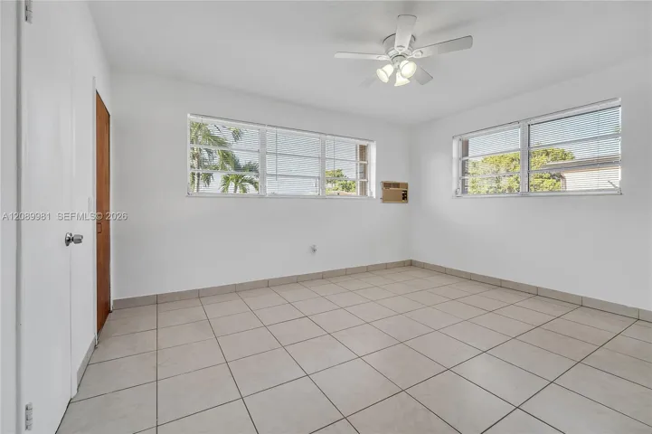 Main bedroom - central A/C! wall unit may not be functional 14.2 X 12.9