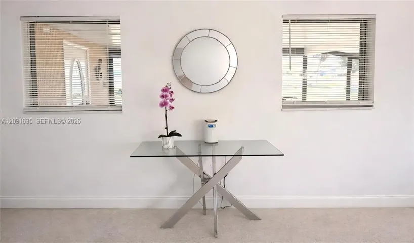 Bright and welcoming entry area highlighting the home's open layout and modern feel