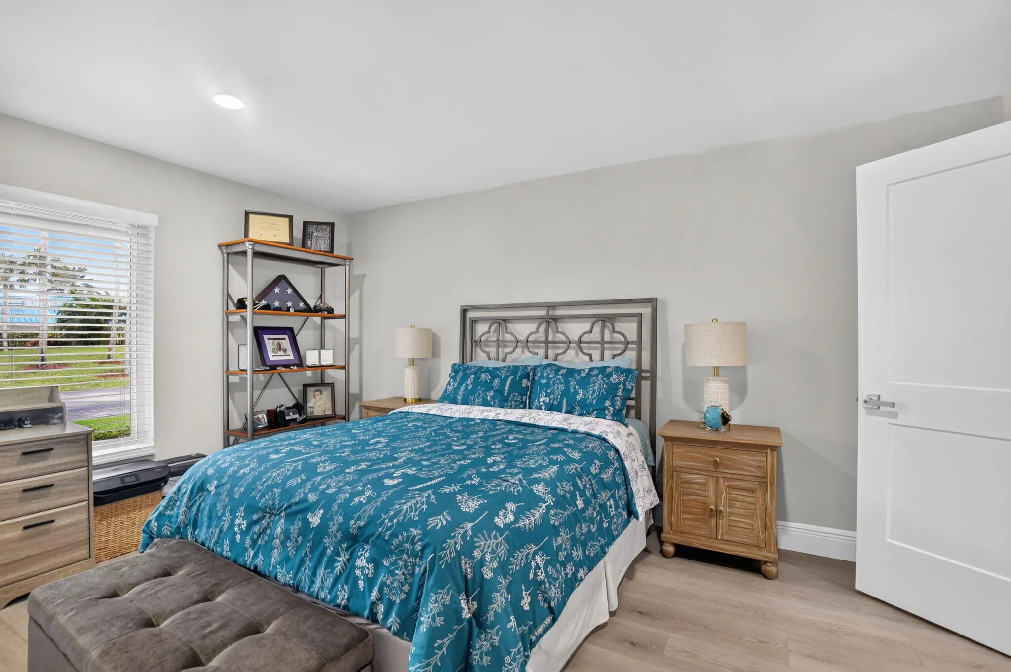 Generous 15' x 12' guest bedroom features an XL wall closet.