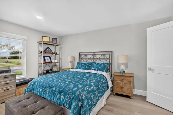 Generous 15' x 12' guest bedroom features an XL wall closet.
