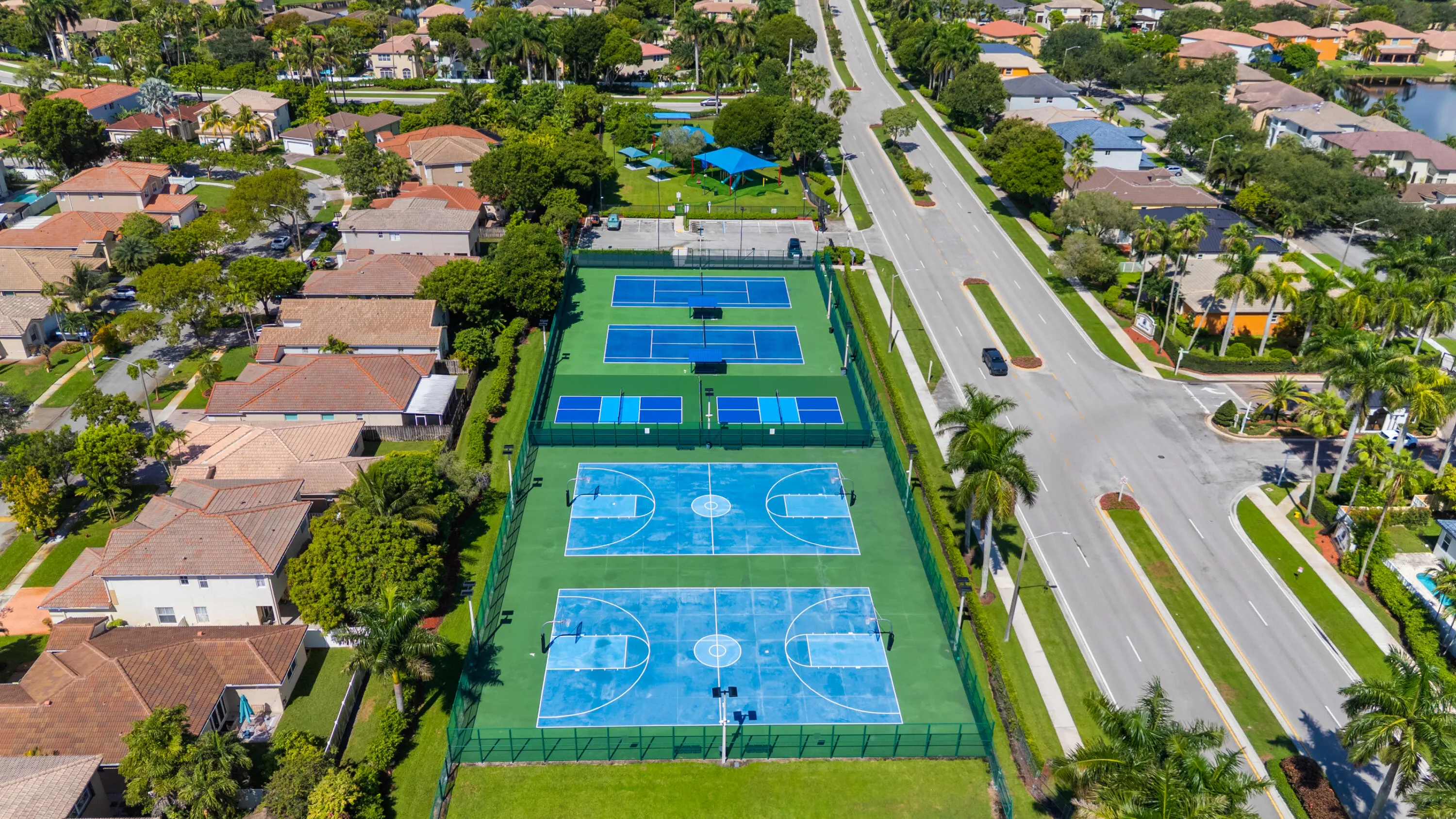 Community tennis, pickleball and basketball courts offering additional outdoor recreation for residents.