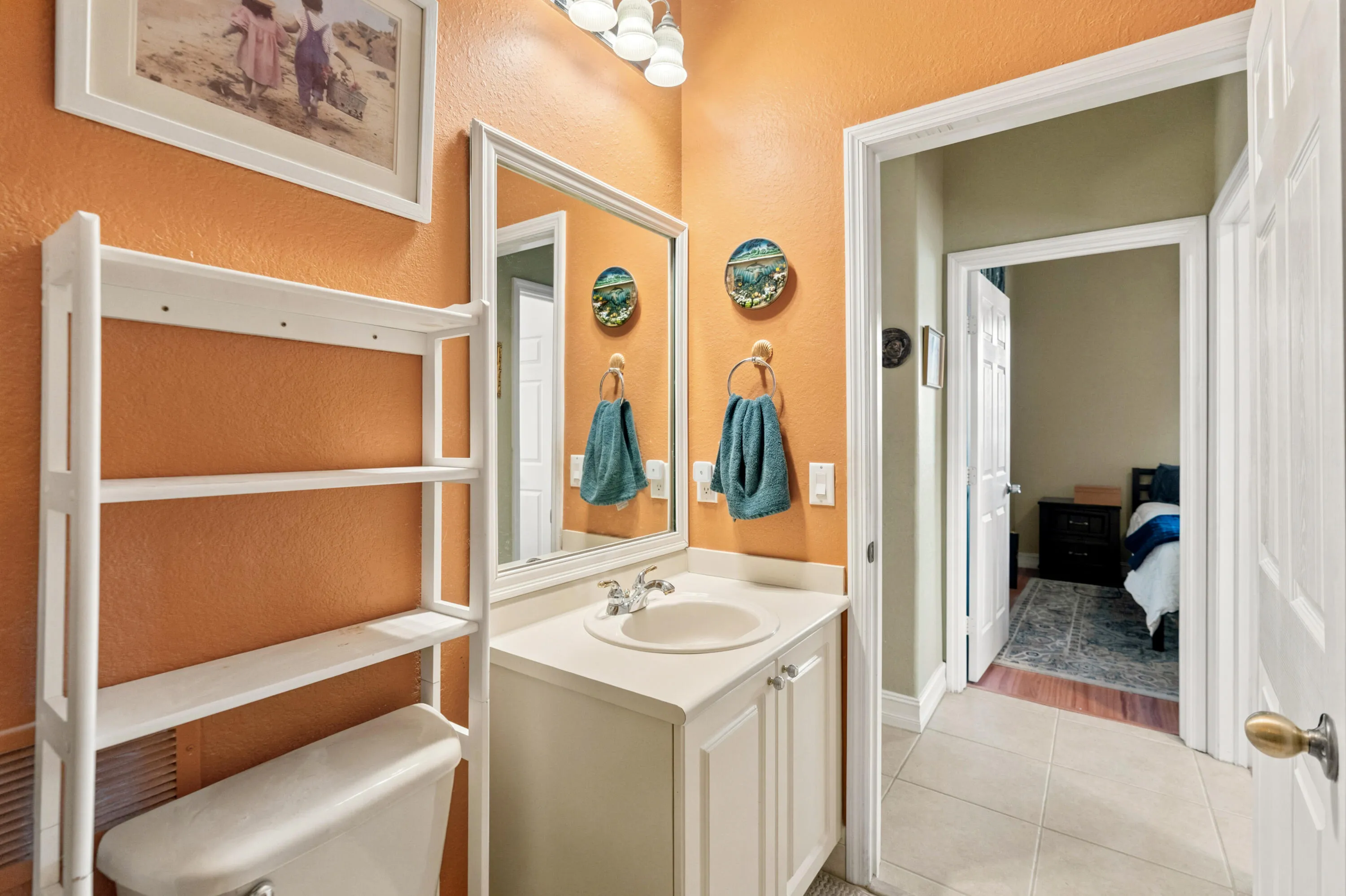 Additional view of the full bath and its convenient connection to the adjacent bedroom area.