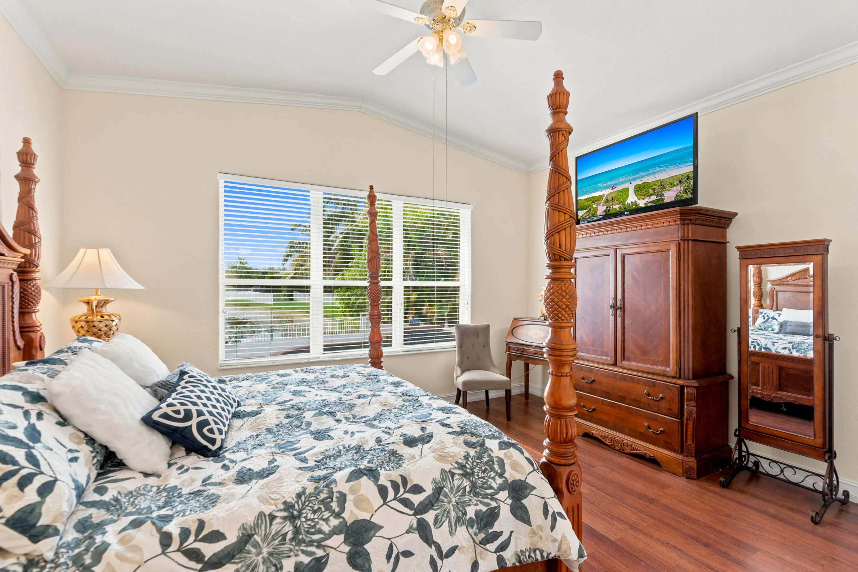 Another angle highlights the primary suite’s generous proportions and expansive window.