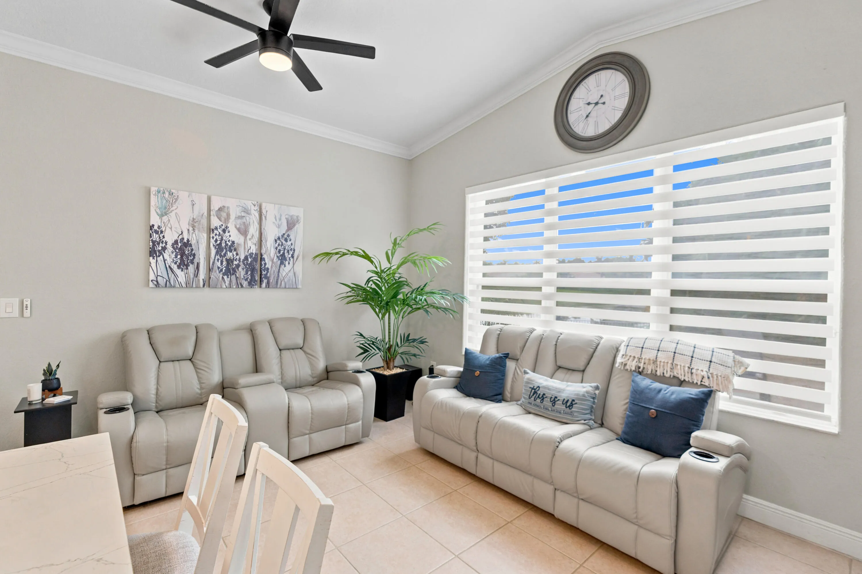 A bright family room provides comfortable gathering space just steps from the kitchen.