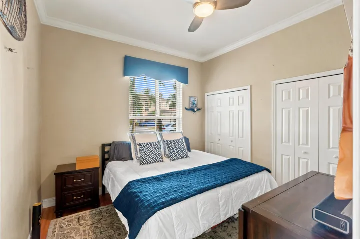 Spacious second bedroom offers ample closet storage.