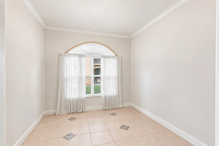 Flexible room that can be used as a den, home office, or home gym.