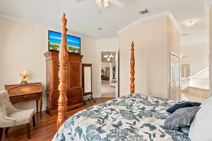 The primary suite connects directly to the bath and closet areas for everyday convenience.