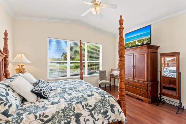 Another angle highlights the primary suite’s generous proportions and expansive window.