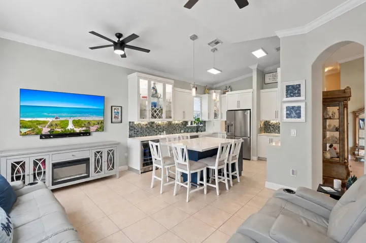 The kitchen and family room come together in a bright, connected gathering space.