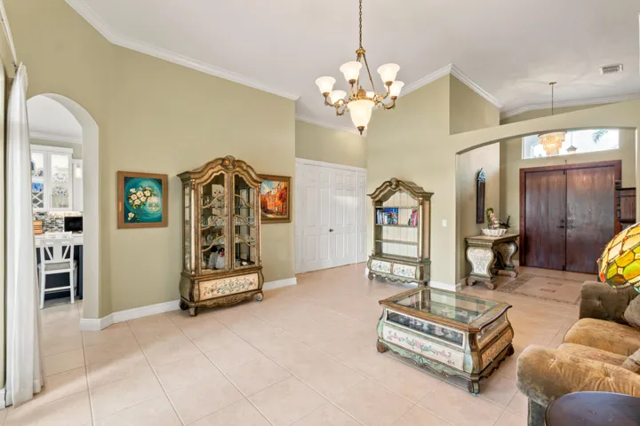 Arched openings create an easy flow between the entry, living area and adjoining spaces.