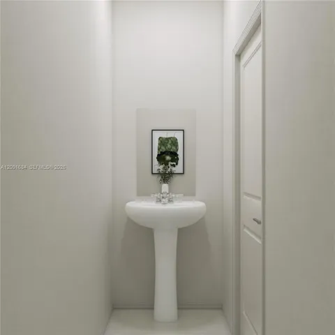 The powder room offers simple access to both guests and residents on the first floor.