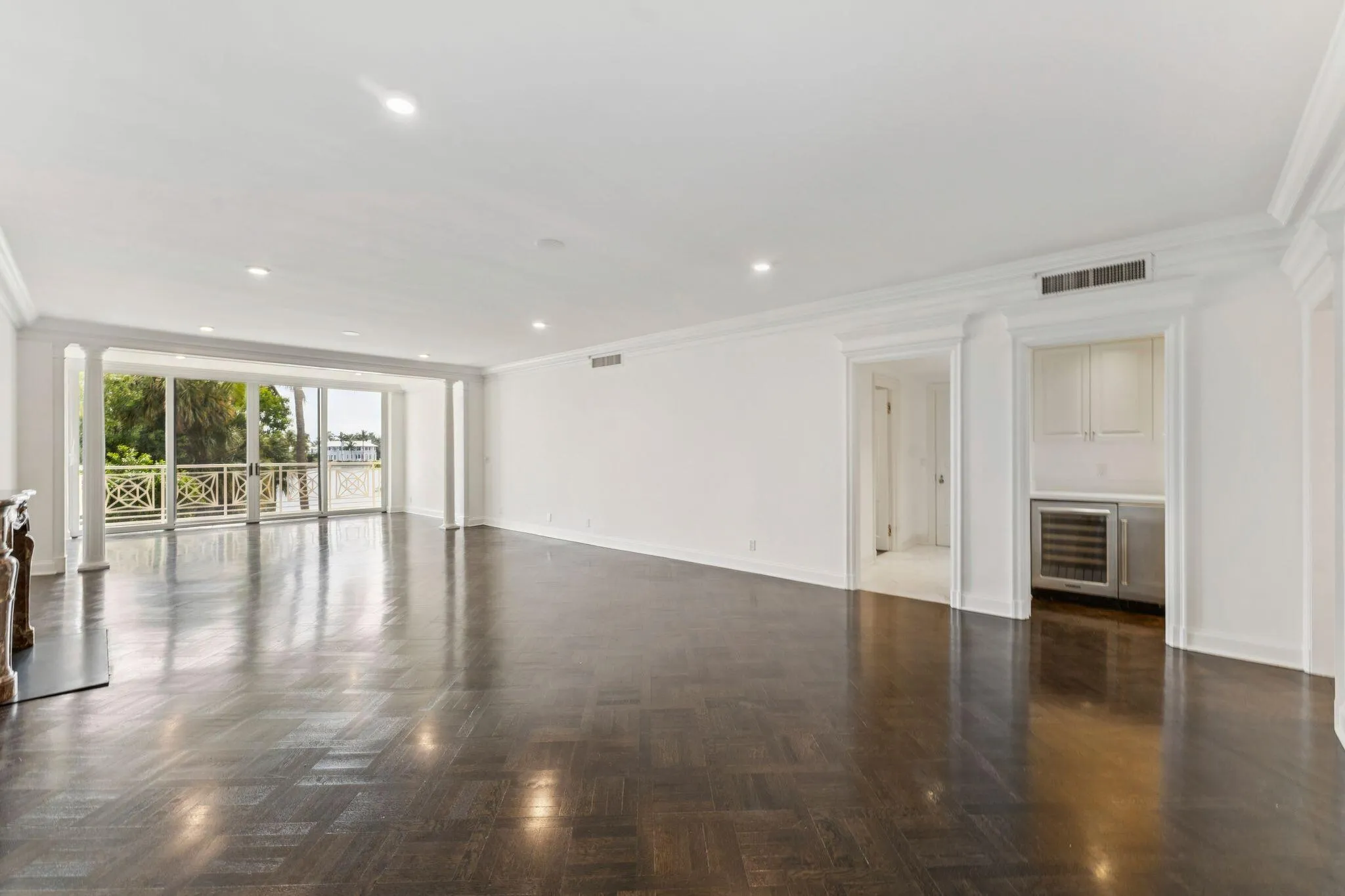 living room, wet bar at right