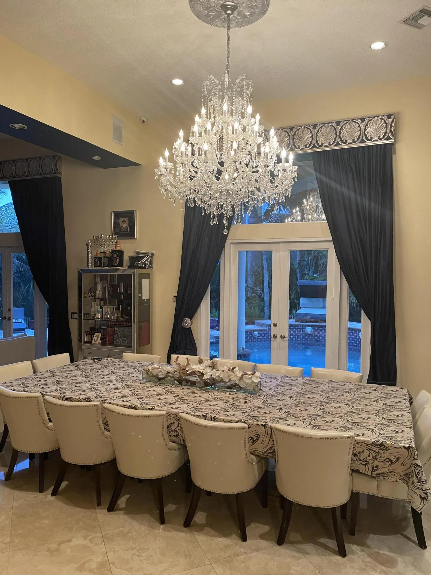 Dining Room open floor to living room and outside to the pool