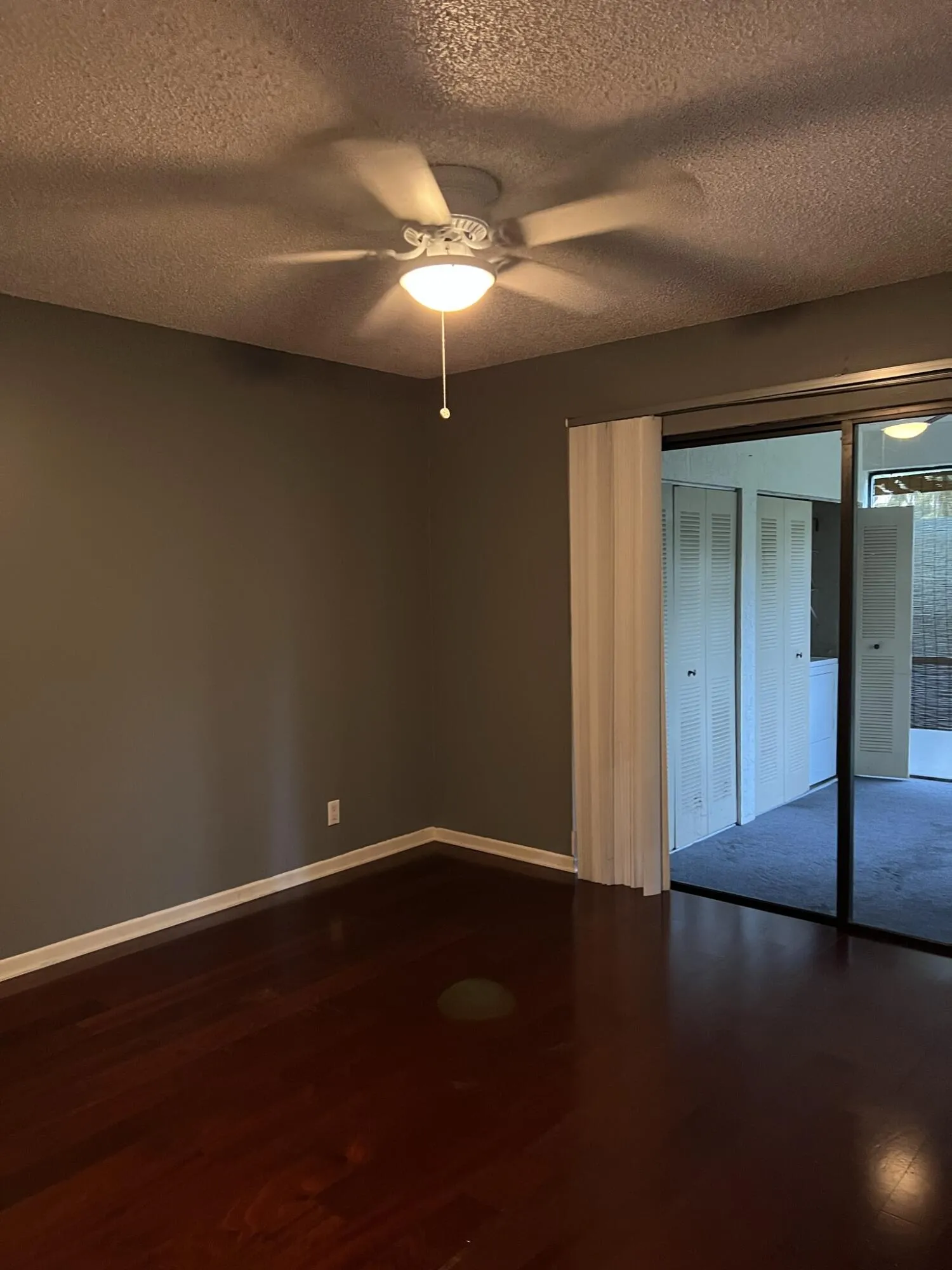 Main level Bedroom opens to the covered patio.