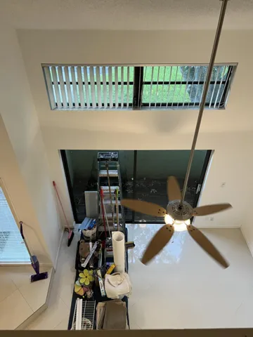 This is complete with a wet bar area and may be used as a formal dining room.