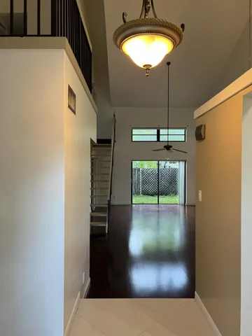 White Porcelain flooring in the entry, kitchen and bonus room.