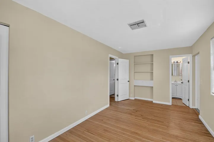 Wood-finish flooring with built-in shelving